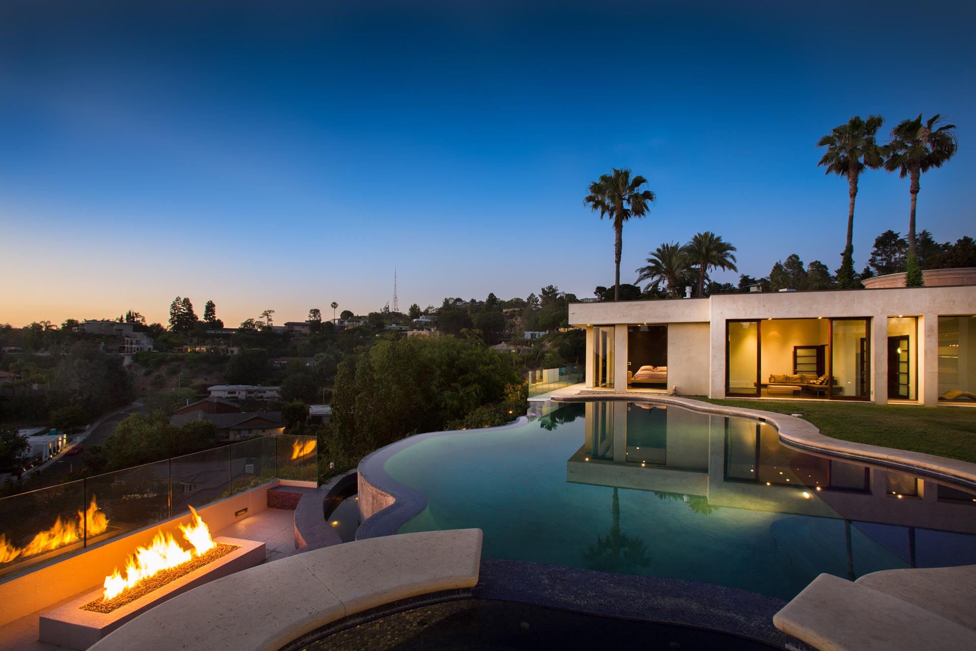 Twilight pool with palms